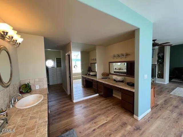a view of living room kitchen and dining room