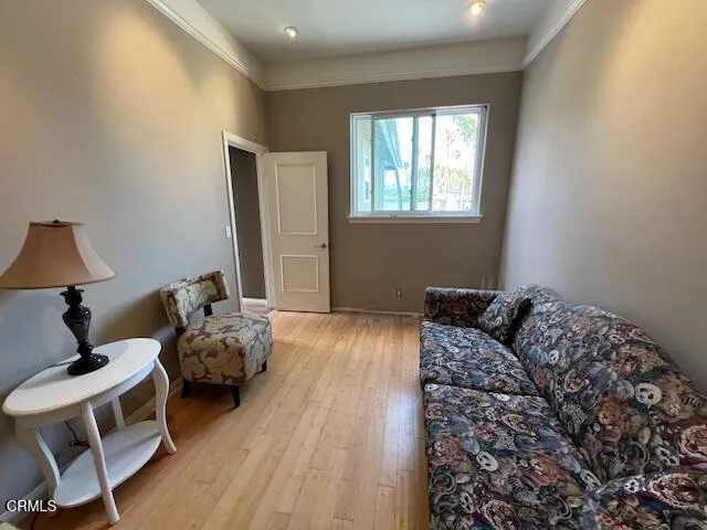 a bedroom with bed and a window