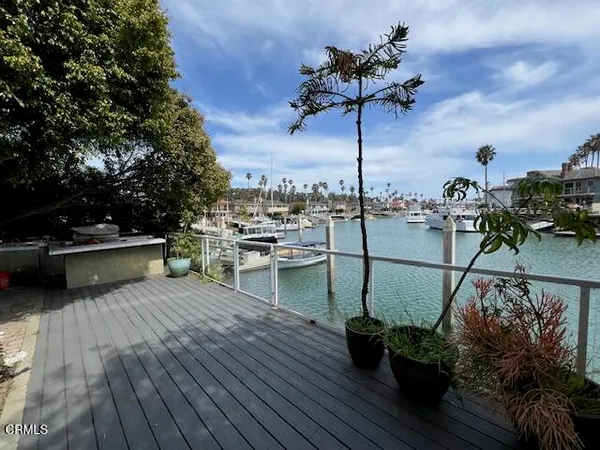 a view of outdoor space with a table and chairs