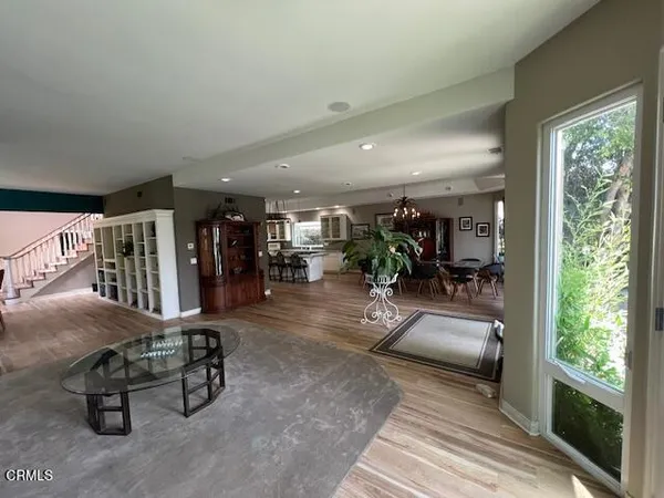 a living room with furniture and a table
