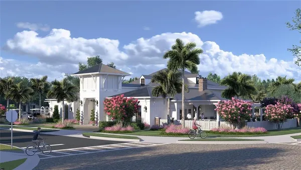 a front view of a house with a yard and a fountain