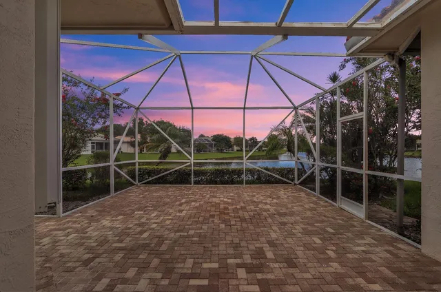 a view of lake with green space