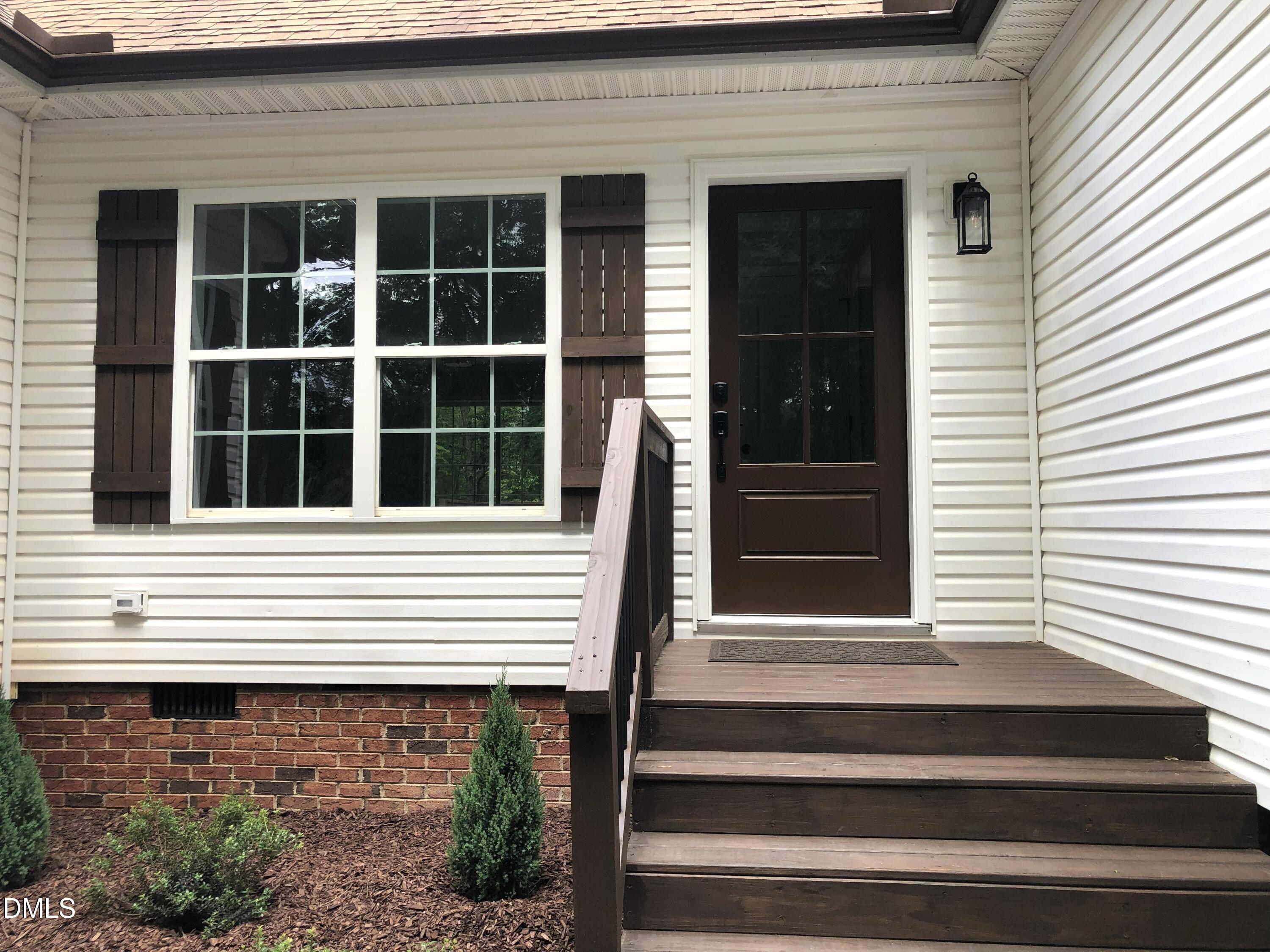 95 Smith Taylor Trail Roxboro, NC 27574 - Photo 10 of 47 a view of a house with a window and stairs