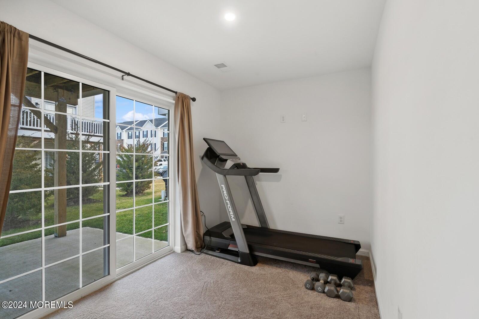 309 Revival Road Brick, NJ 08723 - Photo 12 of 37 a view of a room with gym equipment