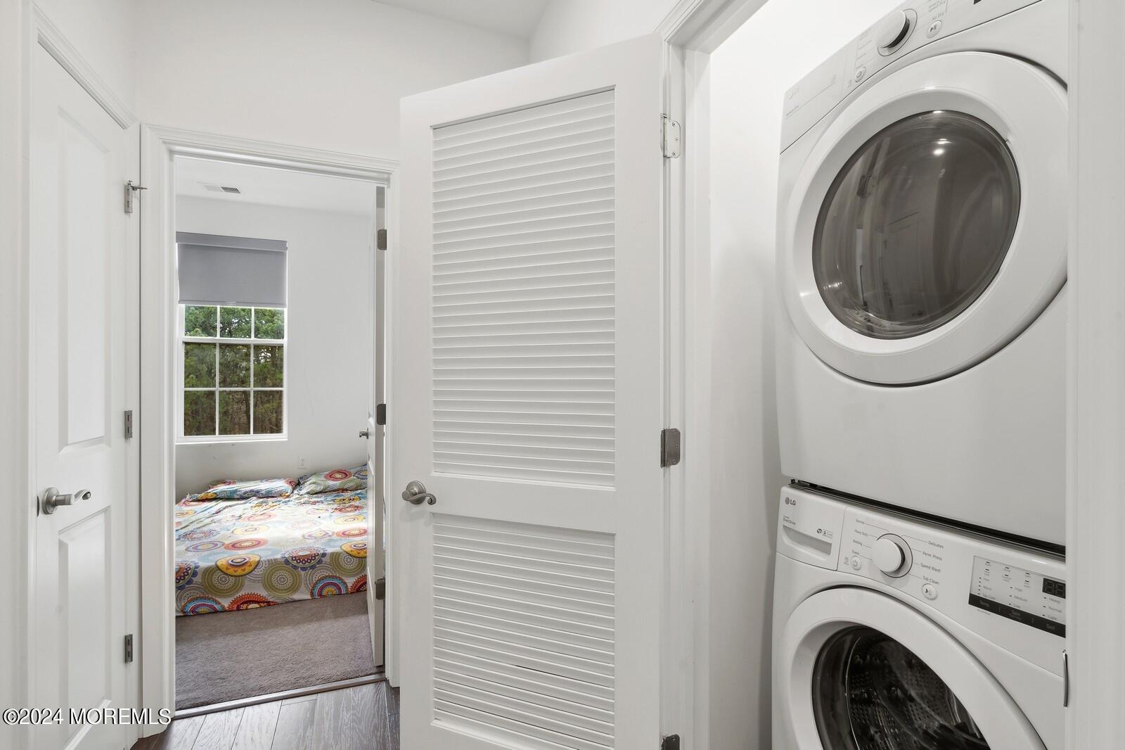 309 Revival Road Brick, NJ 08723 - Photo 25 of 37 a view of a hallway with washer and dryer