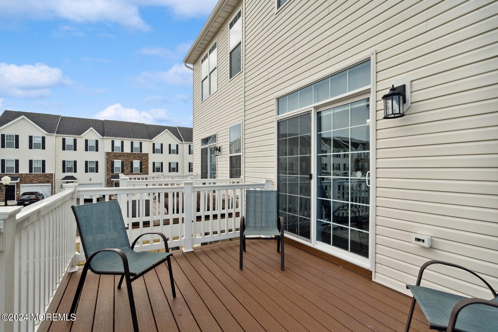 309 Revival Road Brick, NJ 08723 - Photo 27 of 37 a view of a chair and table on the deck