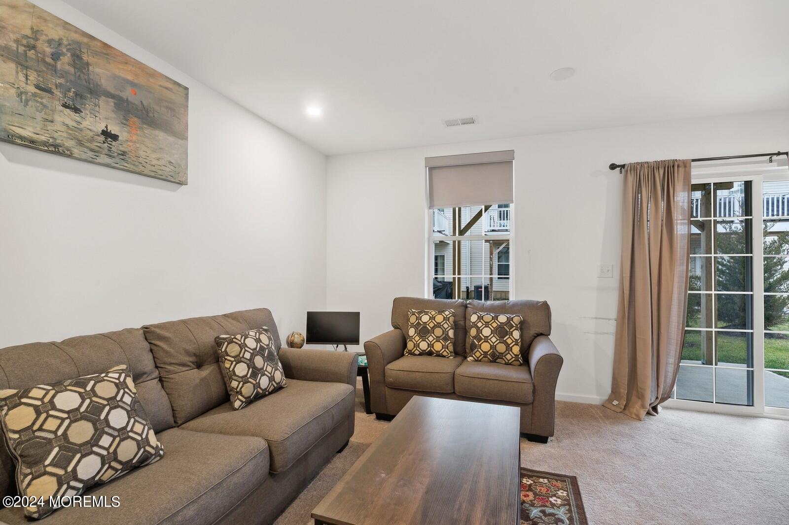 309 Revival Road Brick, NJ 08723 - Photo 4 of 37 a living room with furniture and a potted plant