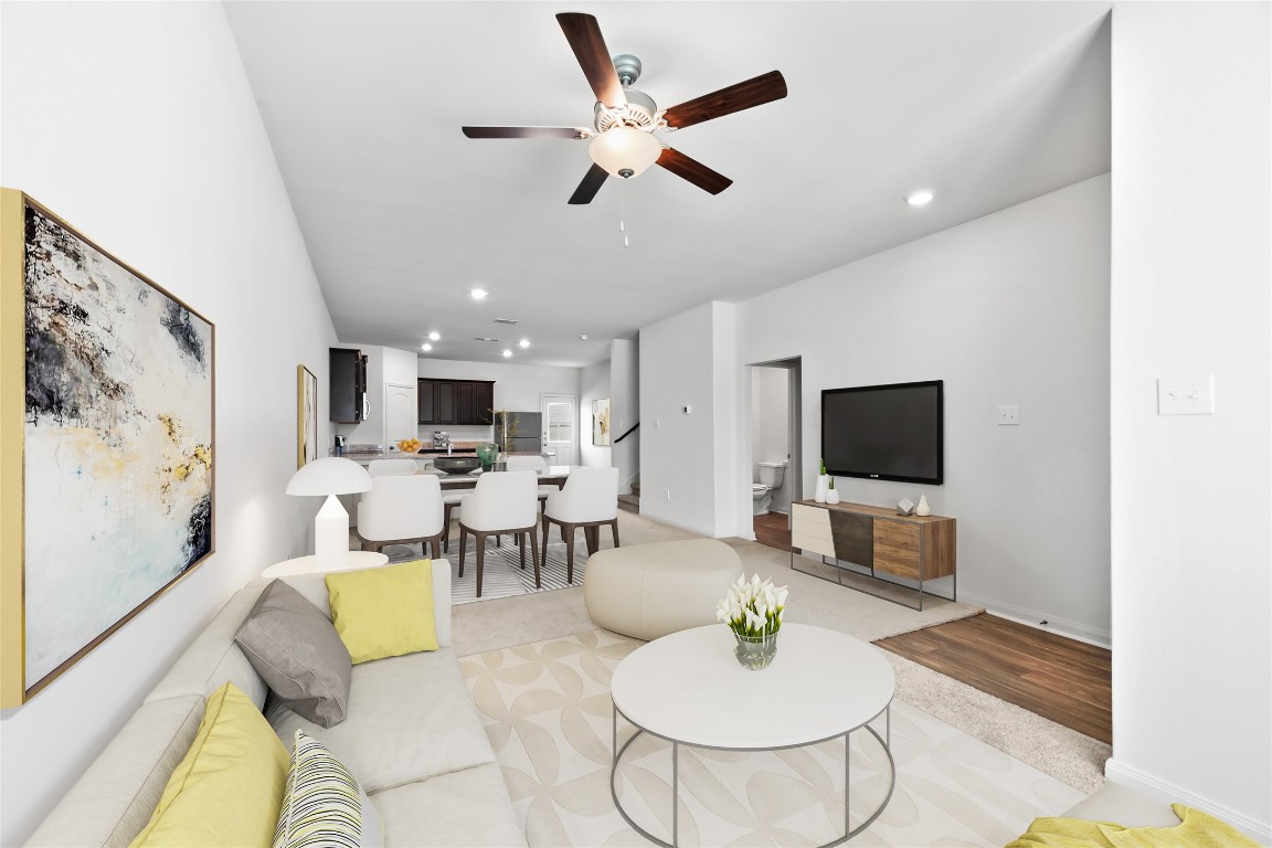 18700 Quiet Range Drive Elgin, TX 78621 - Photo 1 of 1 a living room with furniture and a flat screen tv