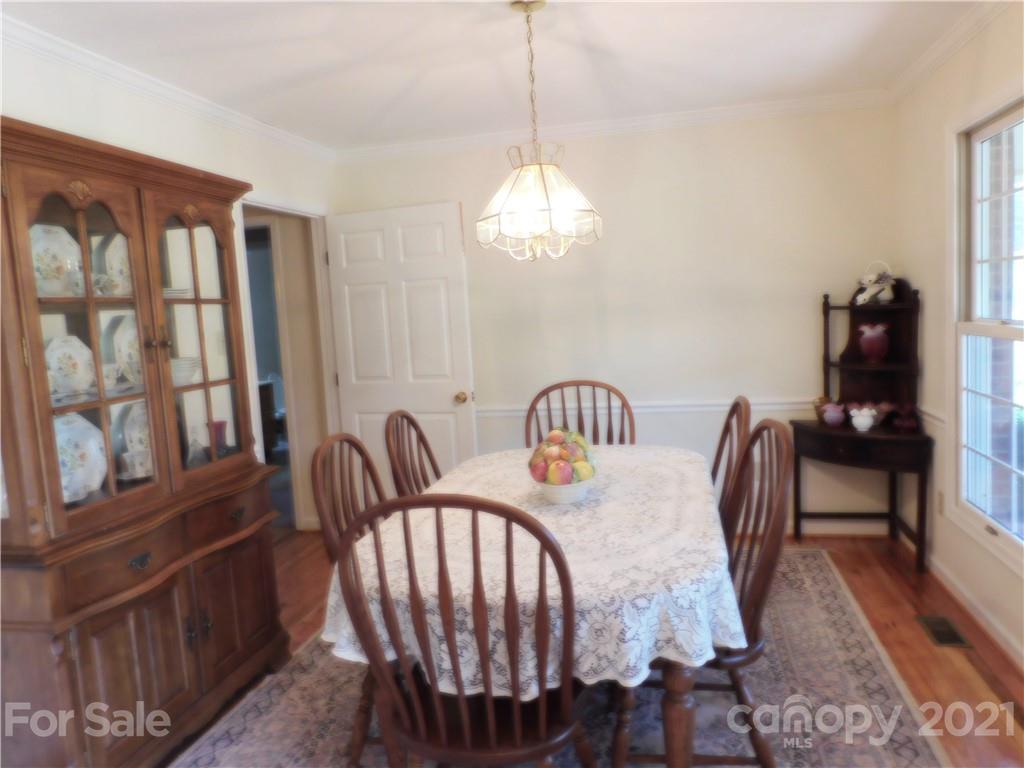 3800 Sherer Road Sharon, SC 29742 - Photo 12 of 42 a view of a dining room with furniture window and wooden floor