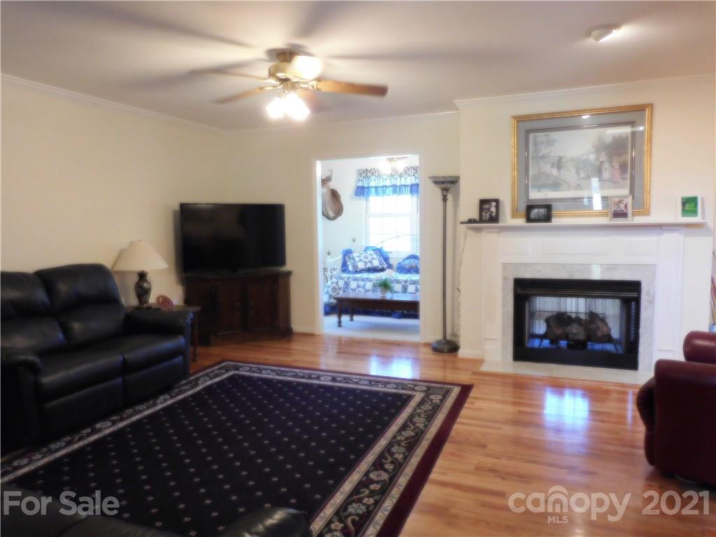 3800 Sherer Road Sharon, SC 29742 - Photo 14 of 42 a living room with furniture and a fireplace