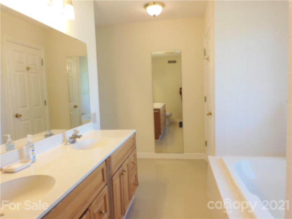 3800 Sherer Road Sharon, SC 29742 - Photo 28 of 42 a bathroom with a sink a shower and a mirror