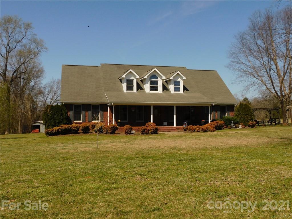 3800 Sherer Road Sharon, SC 29742 - Photo 5 of 42 a view of swimming pool with lawn chairs and plants