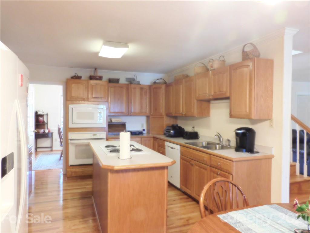 3800 Sherer Road Sharon, SC 29742 - Photo 9 of 42 a kitchen with a sink appliances and cabinets