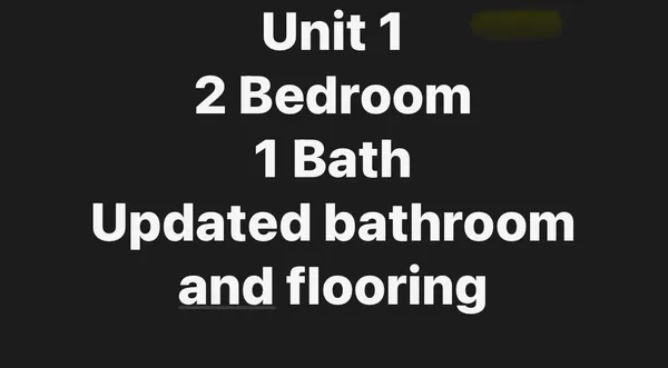 a front of a black and white wall