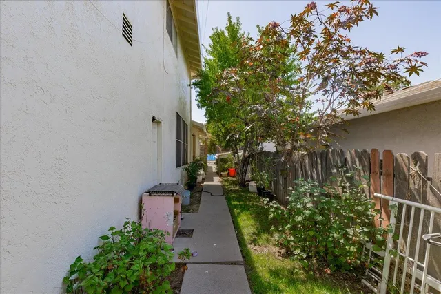 a backyard of a house with lots of green space