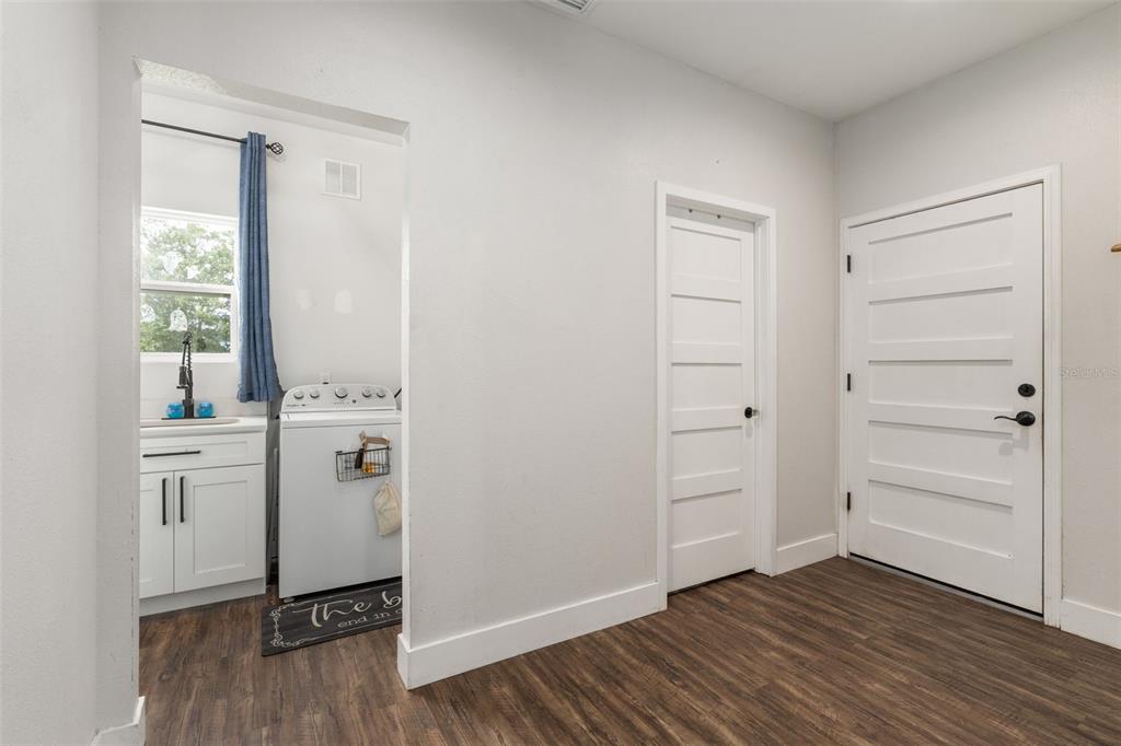 15971 Southeast 64th Street Lake Butler, FL 32054 - Photo 16 of 44 wooden floor in an empty room
