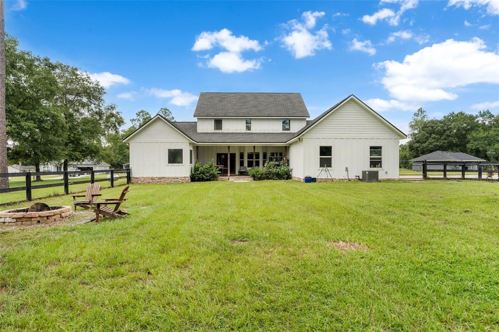 15971 Southeast 64th Street Lake Butler, FL 32054 - Photo 32 of 44 a view of a house with a yard and sitting area