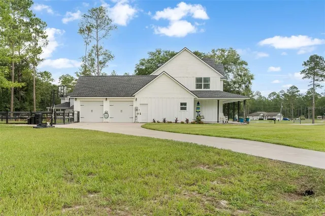 a front view of a house with patio