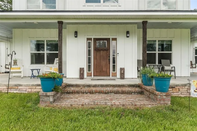 a view of a lake with a yard