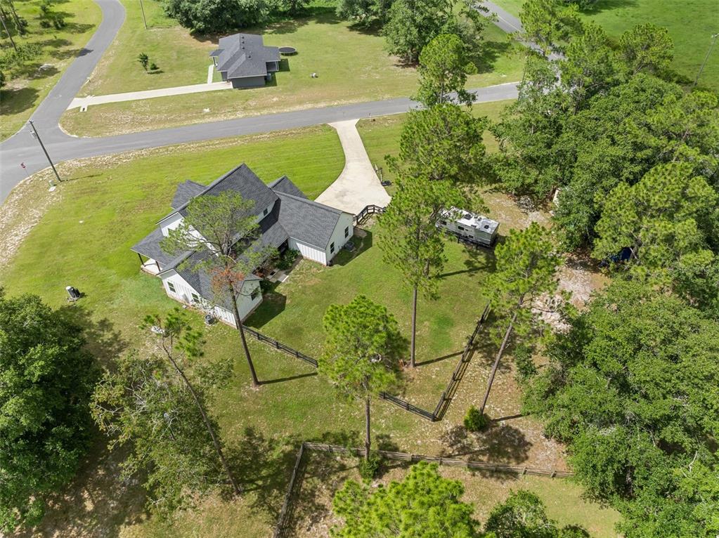 15971 Southeast 64th Street Lake Butler, FL 32054 - Photo 42 of 44 a view of a yard with plants