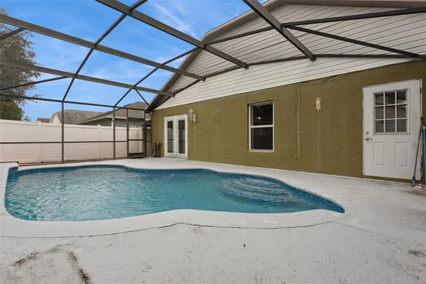 a view of a backyard of a house