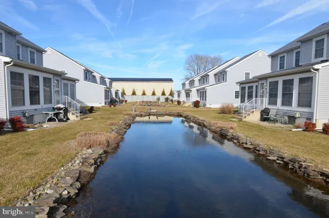 a view of a house with swimming pool