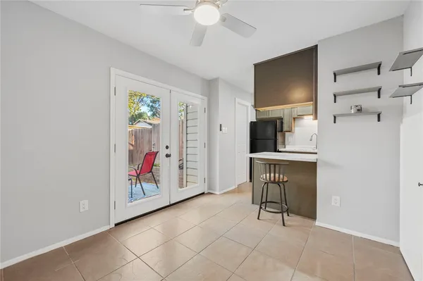 a view of kitchen with furniture and flat screen tv
