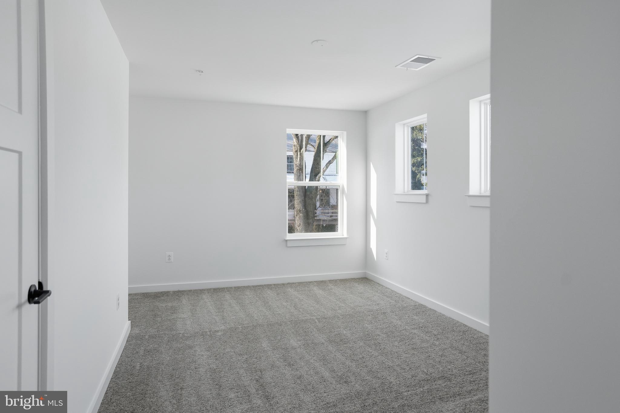 26 Walnut Street Middletown, MD 21769 - Photo 32 of 41 a view of an empty room with a window
