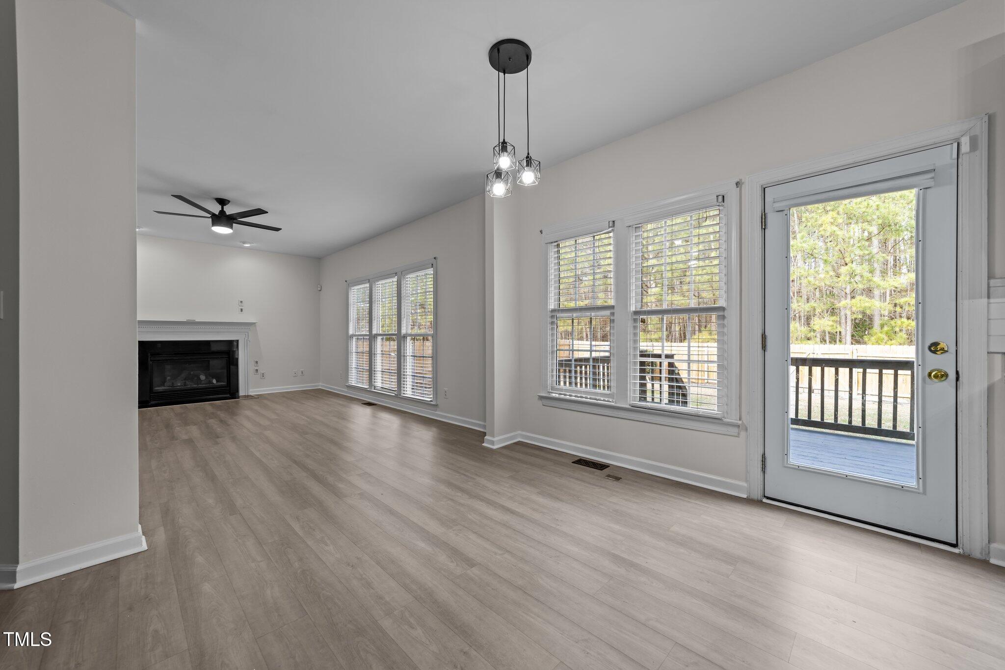 5909 Clarks Fork Drive Raleigh, NC 27616 - Photo 12 of 32 Family Room and Breakfast Area