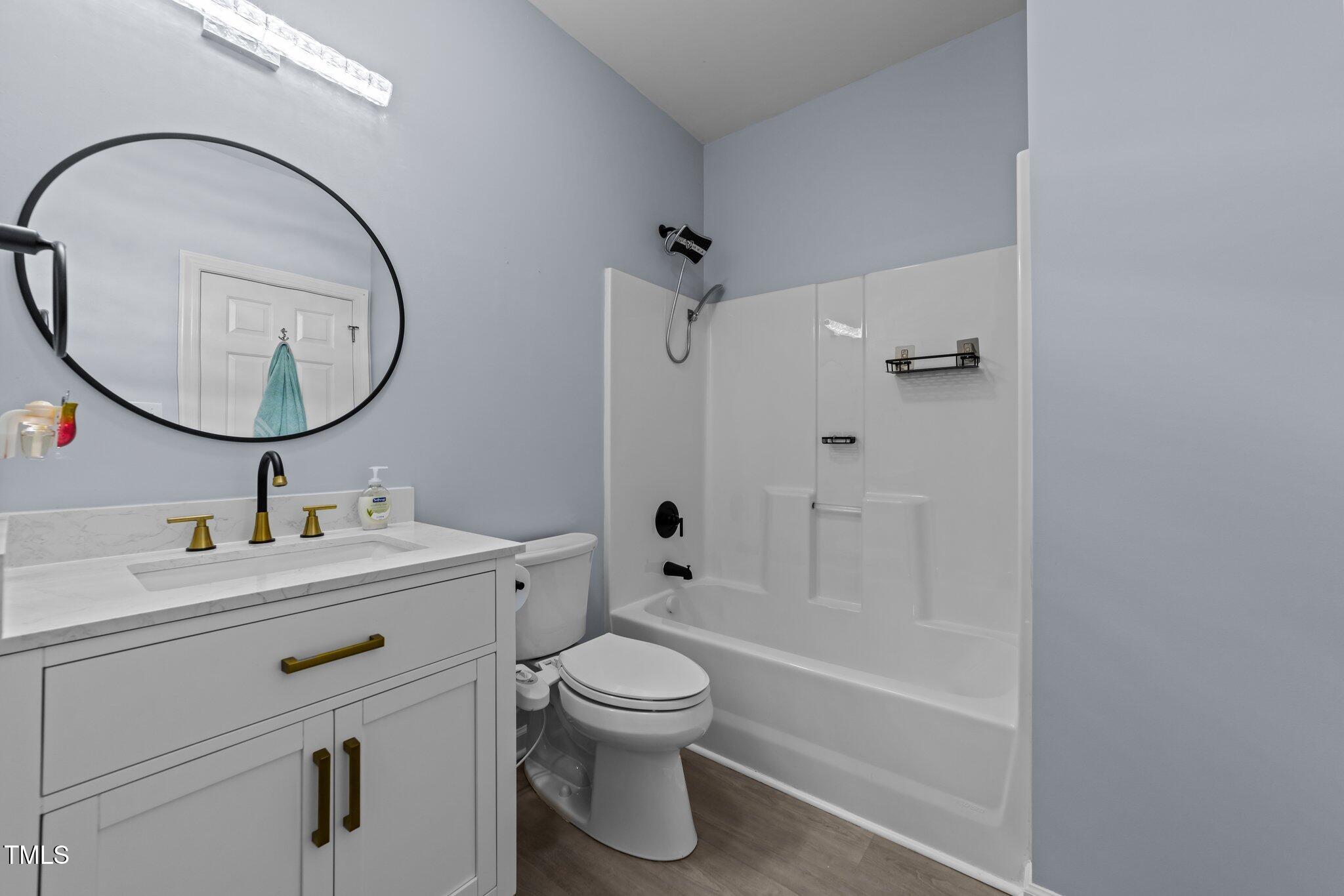 5909 Clarks Fork Drive Raleigh, NC 27616 - Photo 14 of 32 First Floor Bathroom