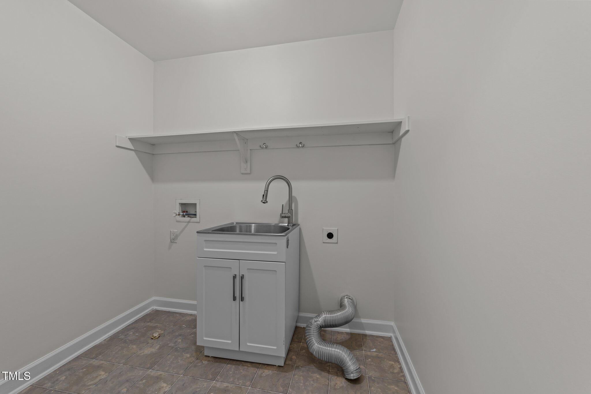 5909 Clarks Fork Drive Raleigh, NC 27616 - Photo 17 of 32 Laundry Room