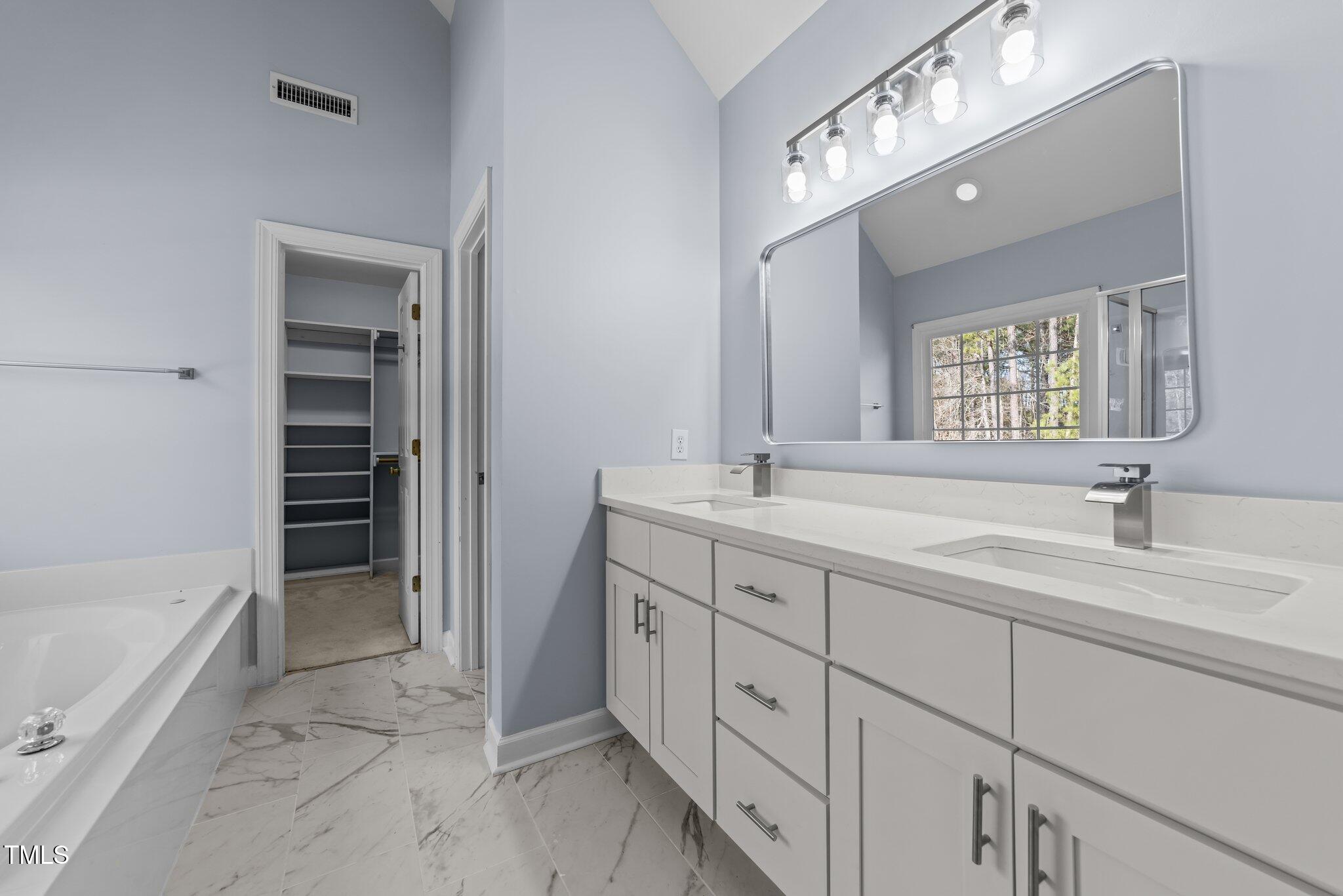 5909 Clarks Fork Drive Raleigh, NC 27616 - Photo 21 of 32 Primary Bathroom