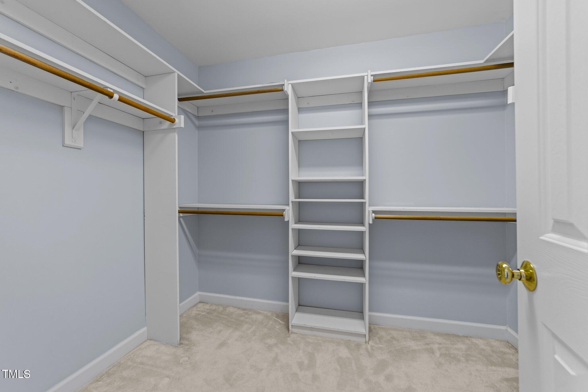 5909 Clarks Fork Drive Raleigh, NC 27616 - Photo 23 of 32 Primary Bedroom Walk in Closet