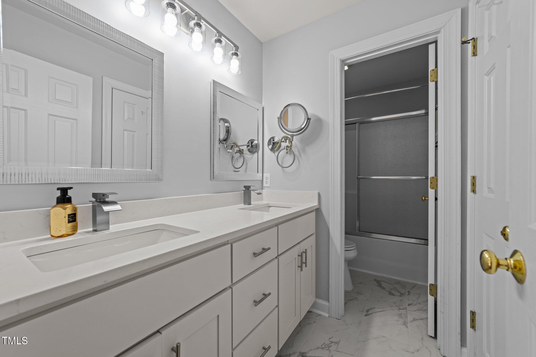 5909 Clarks Fork Drive Raleigh, NC 27616 - Photo 24 of 32 Second Floor Hall Bathroom