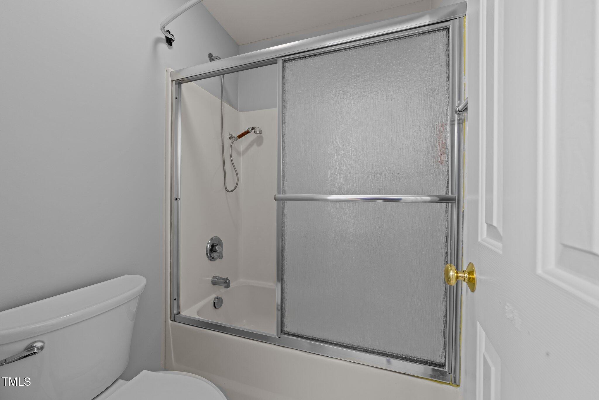 5909 Clarks Fork Drive Raleigh, NC 27616 - Photo 25 of 32 Hall Bathroom Shower