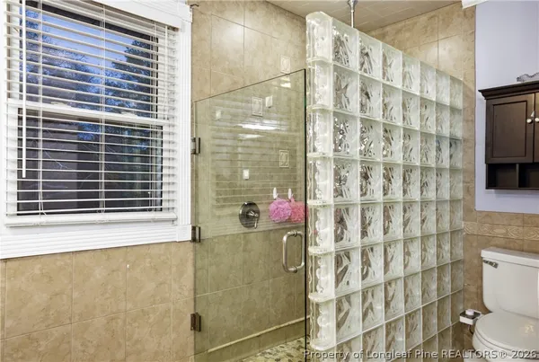 a bathroom with a shower curtain