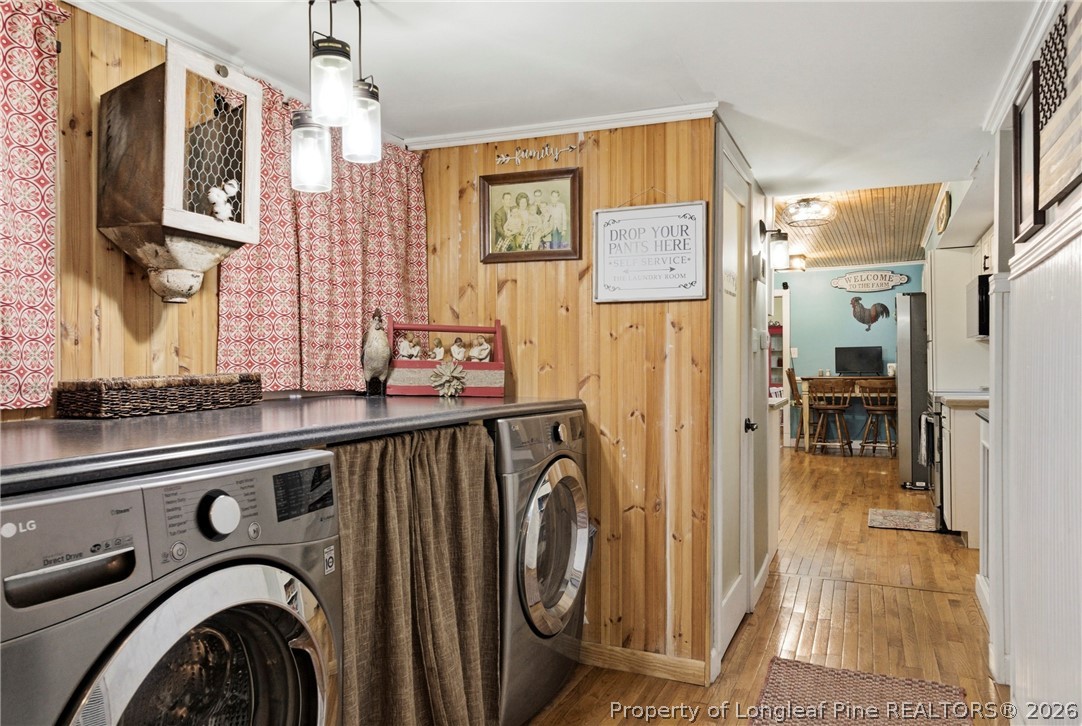 732 County Line Road Roseboro, NC 28382 - Photo 20 of 30 a view of a hallway with washer and dryer