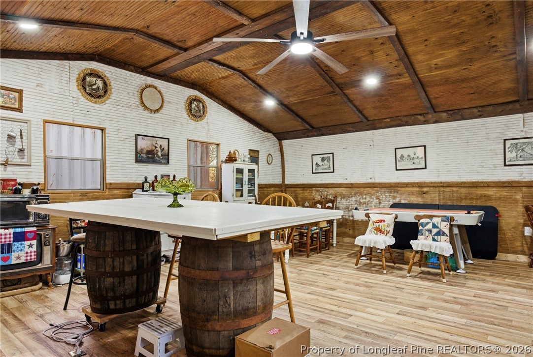 732 County Line Road Roseboro, NC 28382 - Photo 23 of 30 a dining hall with stainless steel appliances granite countertop a stove and a dining table with chair