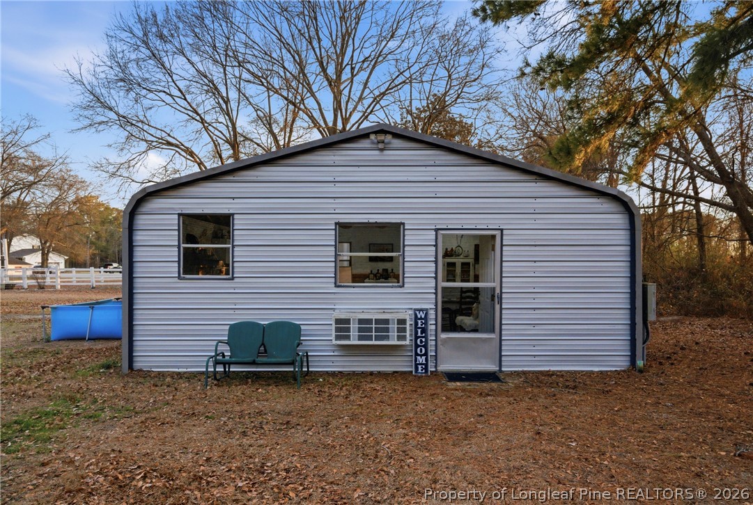 732 County Line Road Roseboro, NC 28382 - Photo 25 of 30 a front view of a house with a yard
