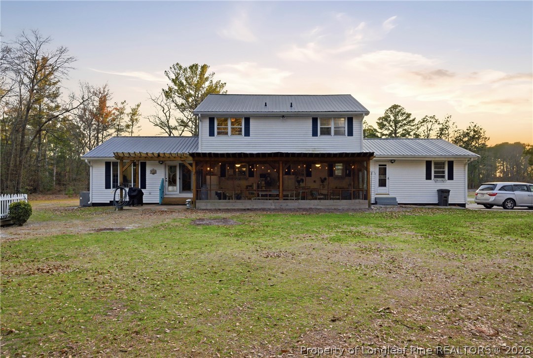 732 County Line Road Roseboro, NC 28382 - Photo 3 of 30 a front view of a house with garden