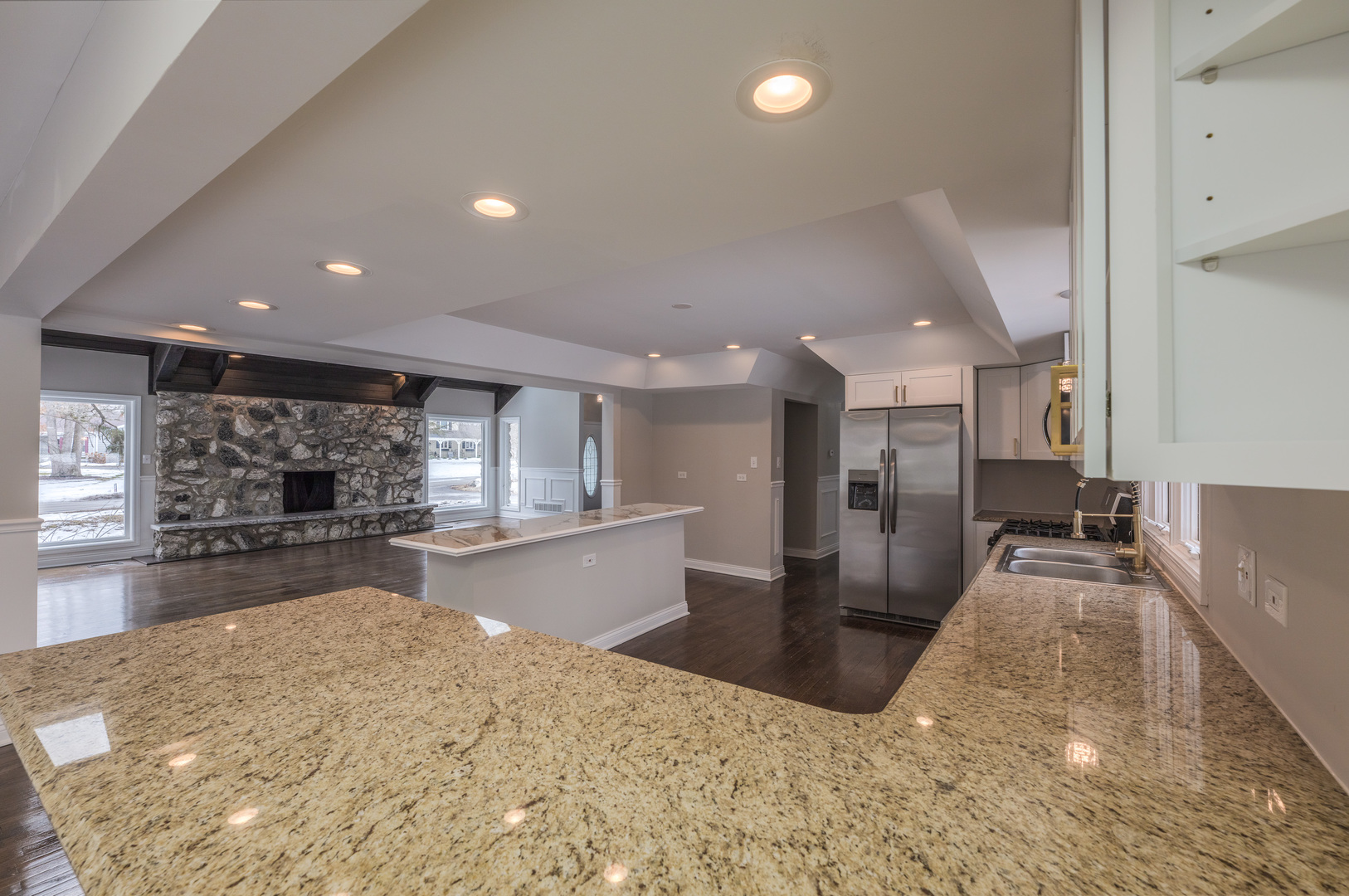 129 Cornwall Drive Crete, IL 60417 - Photo 12 of 52 a kitchen with stainless steel appliances kitchen island granite countertop a refrigerator and stove