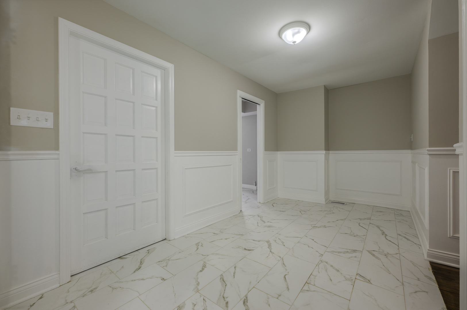 129 Cornwall Drive Crete, IL 60417 - Photo 17 of 52 an empty room with white walls and tiles