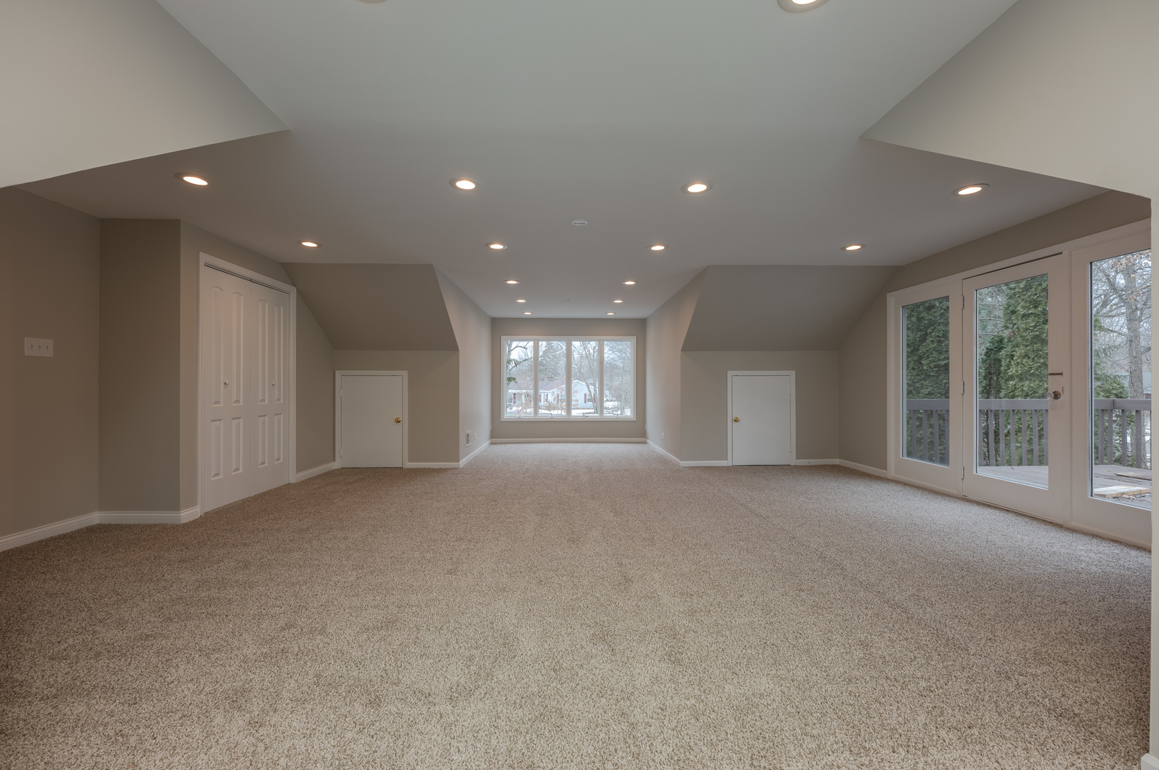 129 Cornwall Drive Crete, IL 60417 - Photo 24 of 52 a view of a big room with windows and chandelier