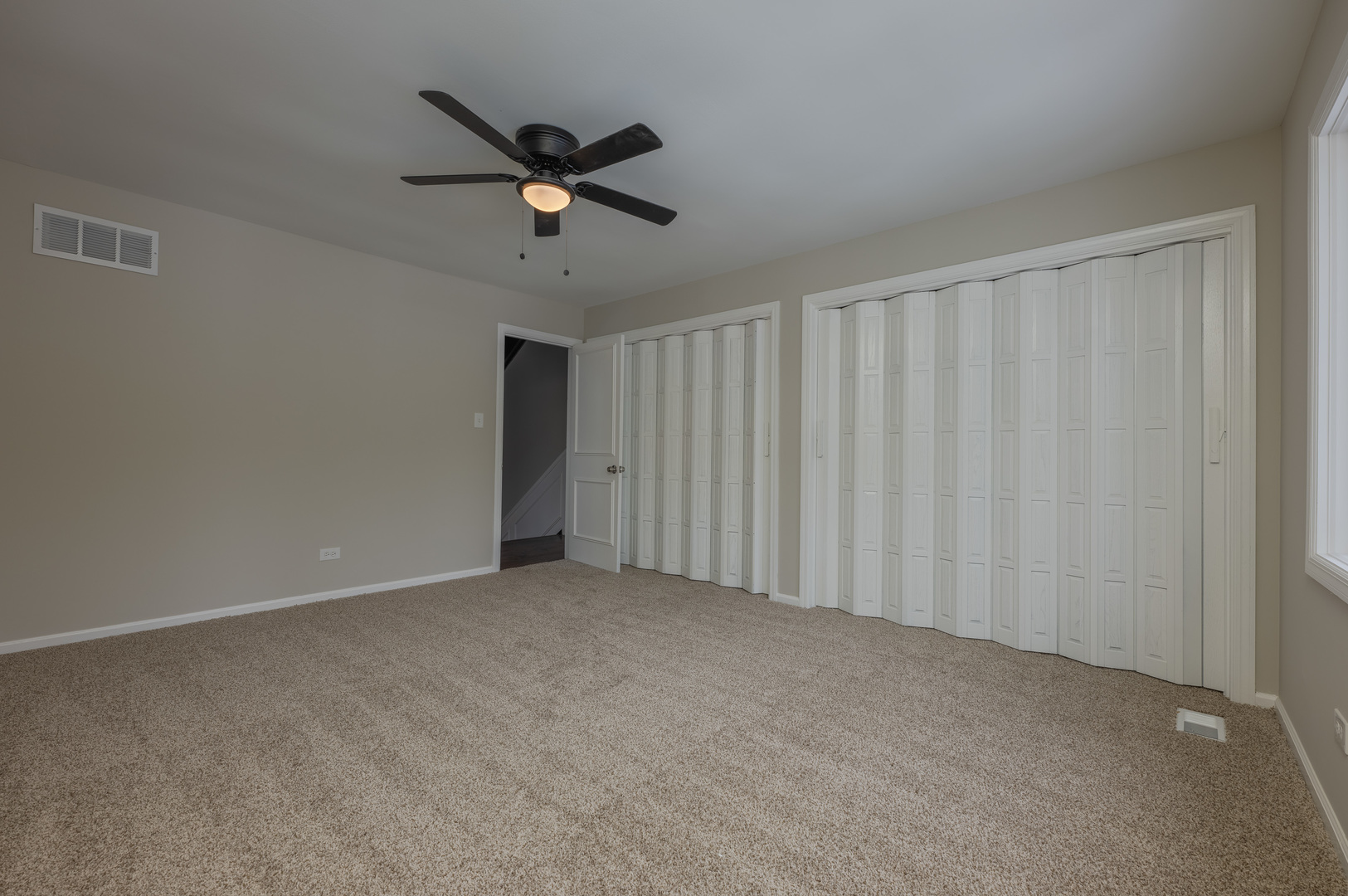 129 Cornwall Drive Crete, IL 60417 - Photo 25 of 52 a view of an empty room and wooden floor