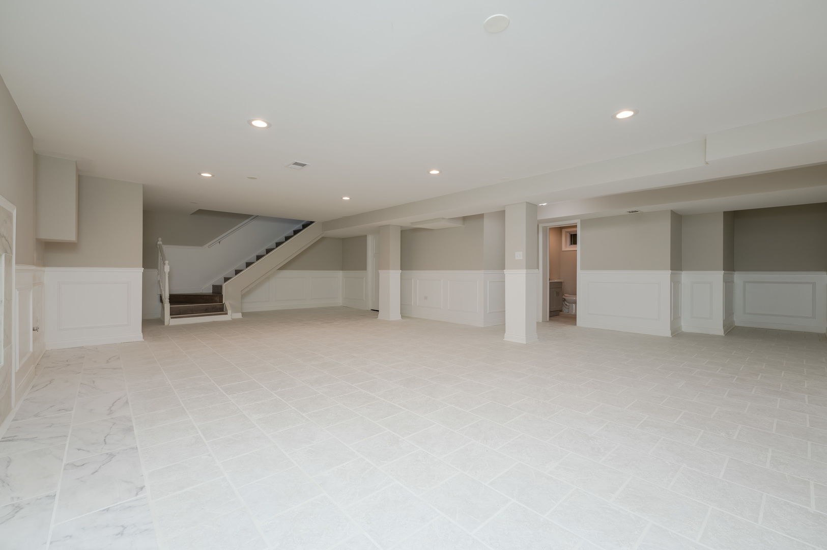 129 Cornwall Drive Crete, IL 60417 - Photo 39 of 52 an empty room with a ceiling fan and entryway