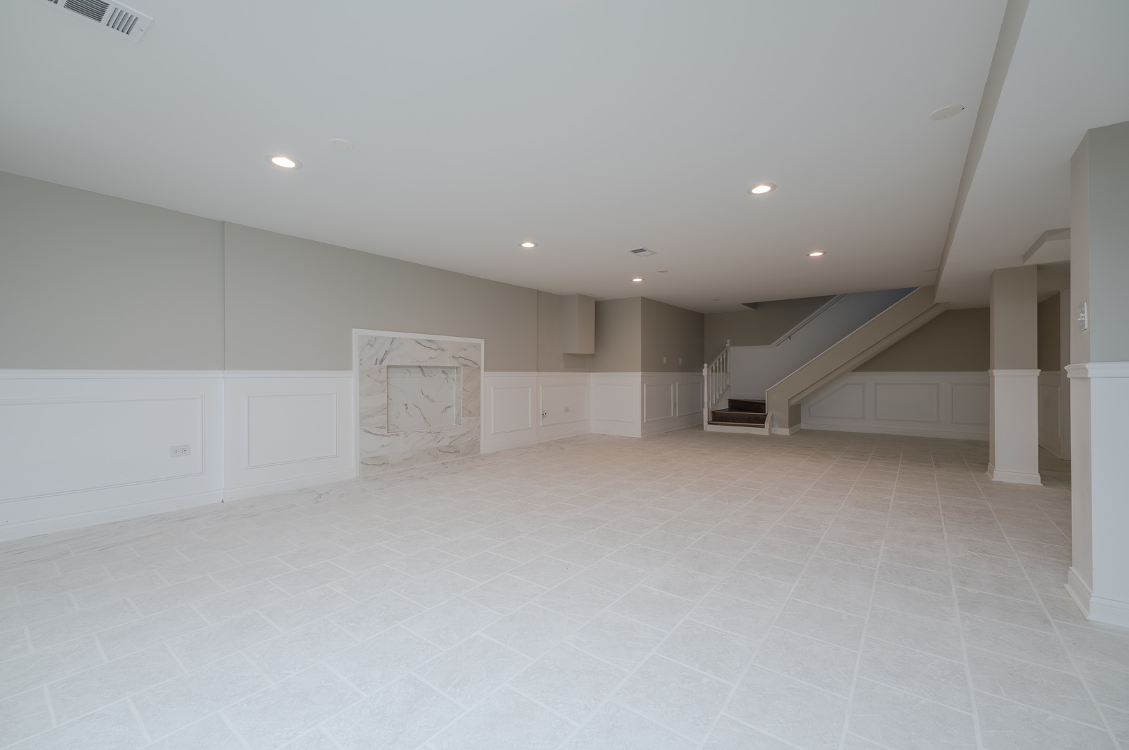 129 Cornwall Drive Crete, IL 60417 - Photo 42 of 52 an empty room with a stairs and way to living room