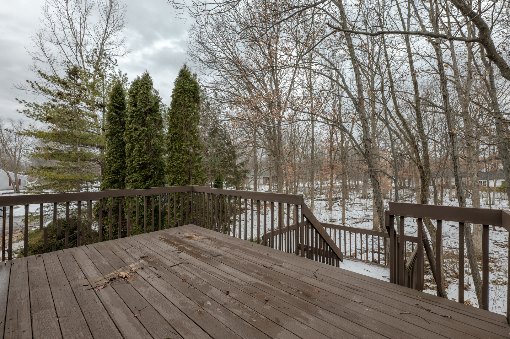 129 Cornwall Drive Crete, IL 60417 - Photo 50 of 52 a balcony with wooden floor and fence