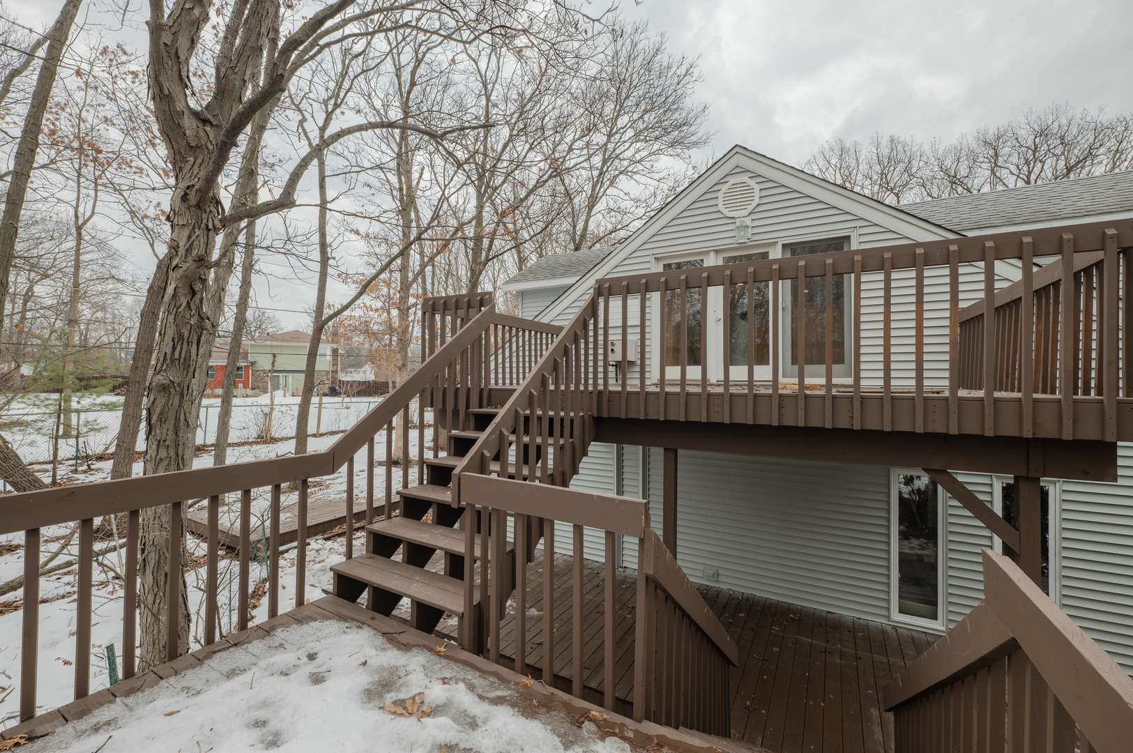 129 Cornwall Drive Crete, IL 60417 - Photo 51 of 52 a view of wooden house with a deck
