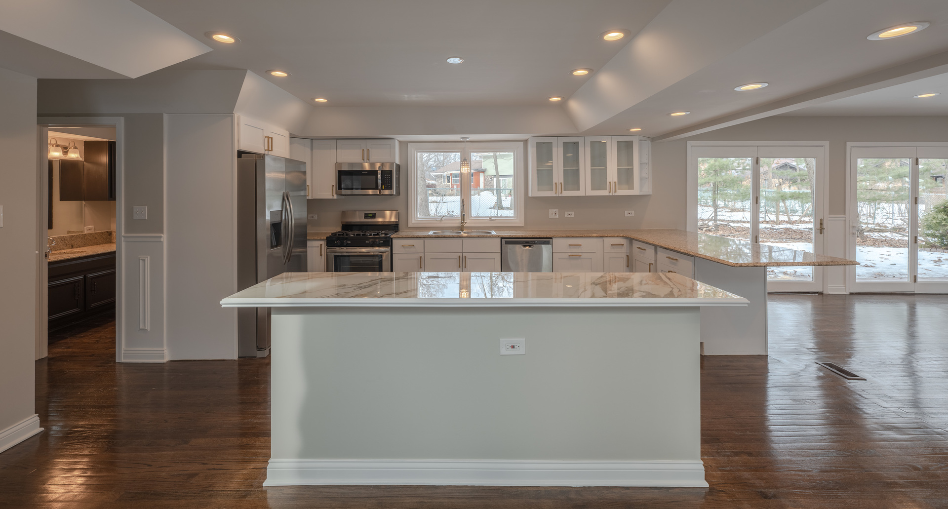 129 Cornwall Drive Crete, IL 60417 - Photo 7 of 52 a large kitchen with kitchen island a large counter space and stainless steel appliances