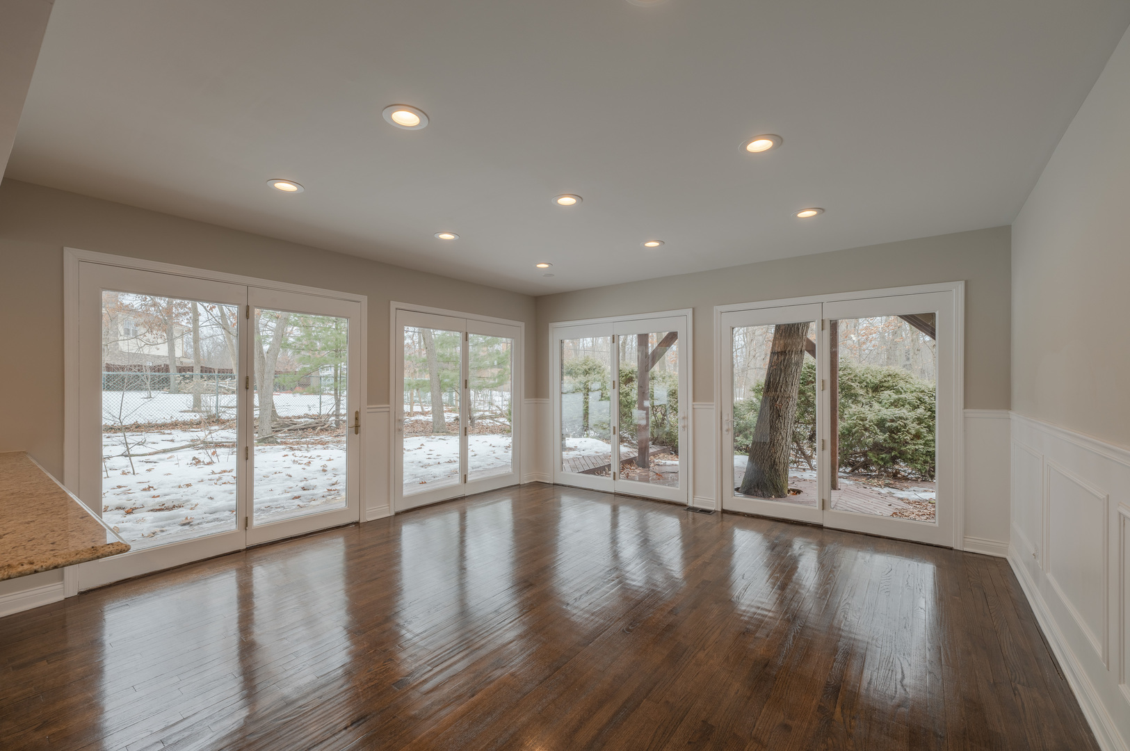 129 Cornwall Drive Crete, IL 60417 - Photo 9 of 52 a view of an empty room with wooden floor and a window